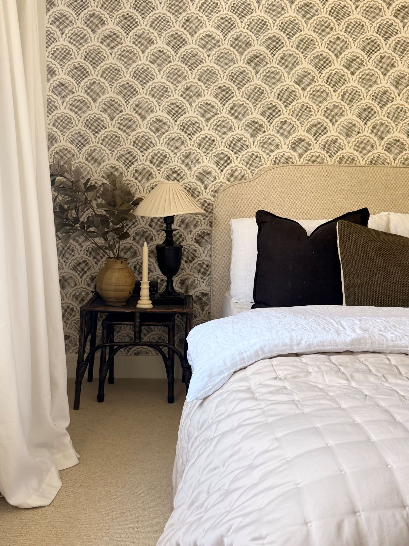 cream bedroom carpet with a double bed